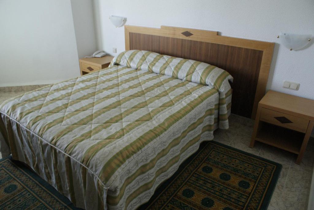 Postel nebo postele na pokoji v ubytování El Mouradi Cap Mahdia
