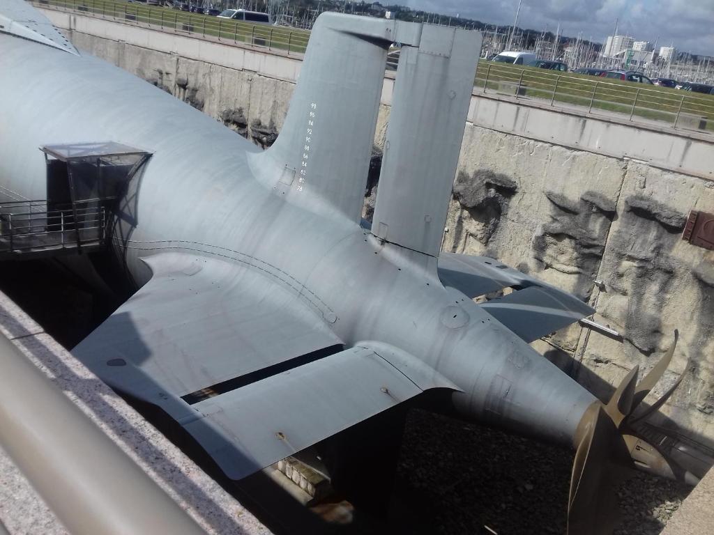 a plane that is sitting in a building at Chambres d'Hotes Elvire et Laurent Barbey in Sainte-Marie-du-Mont