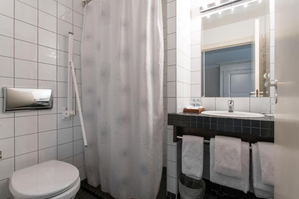 Kúpeľňa v ubytovaní Hotel Búdir