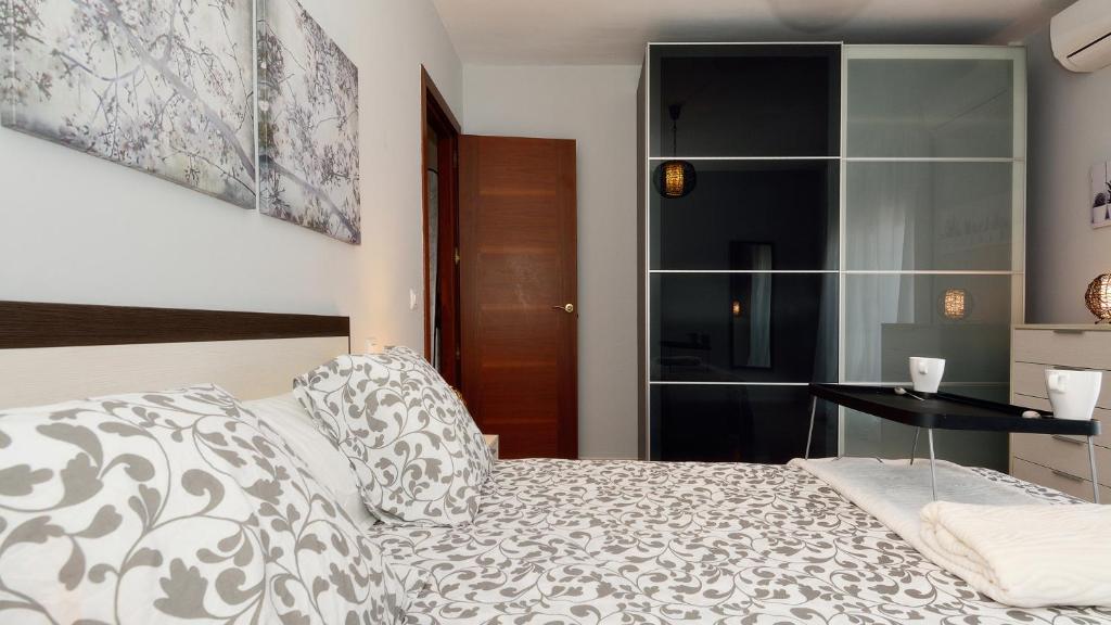 Postel nebo postele na pokoji v ubytování Villa Isla Feliz