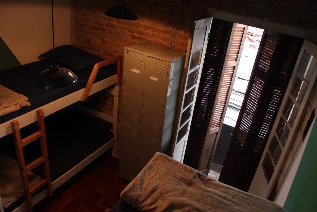 Postel nebo postele na pokoji v ubytování NeighborHUB hostel e coliving