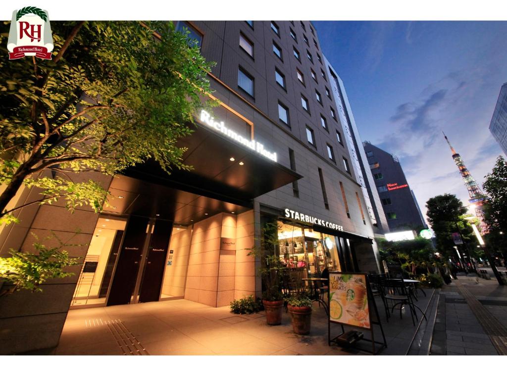 a store front of a building on a city street at Richmond Hotel Tokyo Shiba in Tokyo