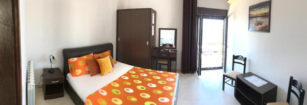 Postel nebo postele na pokoji v ubytování Paradiso Apartments - Liman1