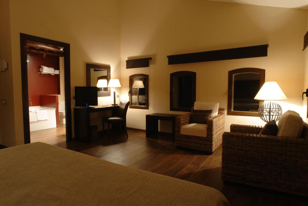 Postel nebo postele na pokoji v ubytování Molí Blanc Hotel
