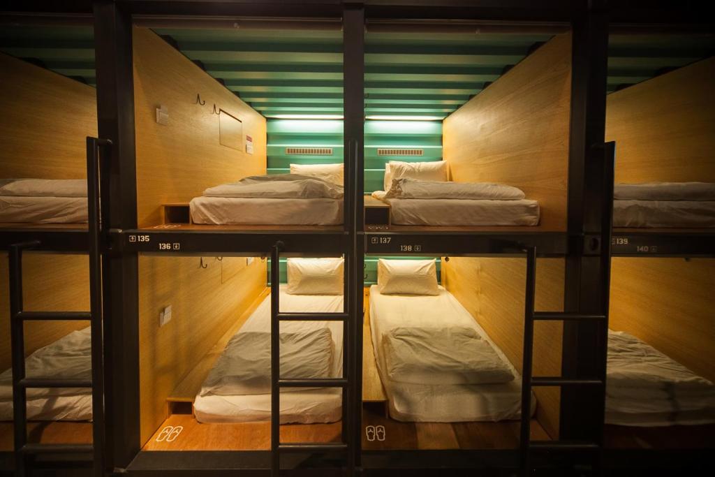 Letto o letti in una camera di CapsuleTransit Landside - Airport Hotel - Public Area - Gateway KLIA T2, Lvl 1