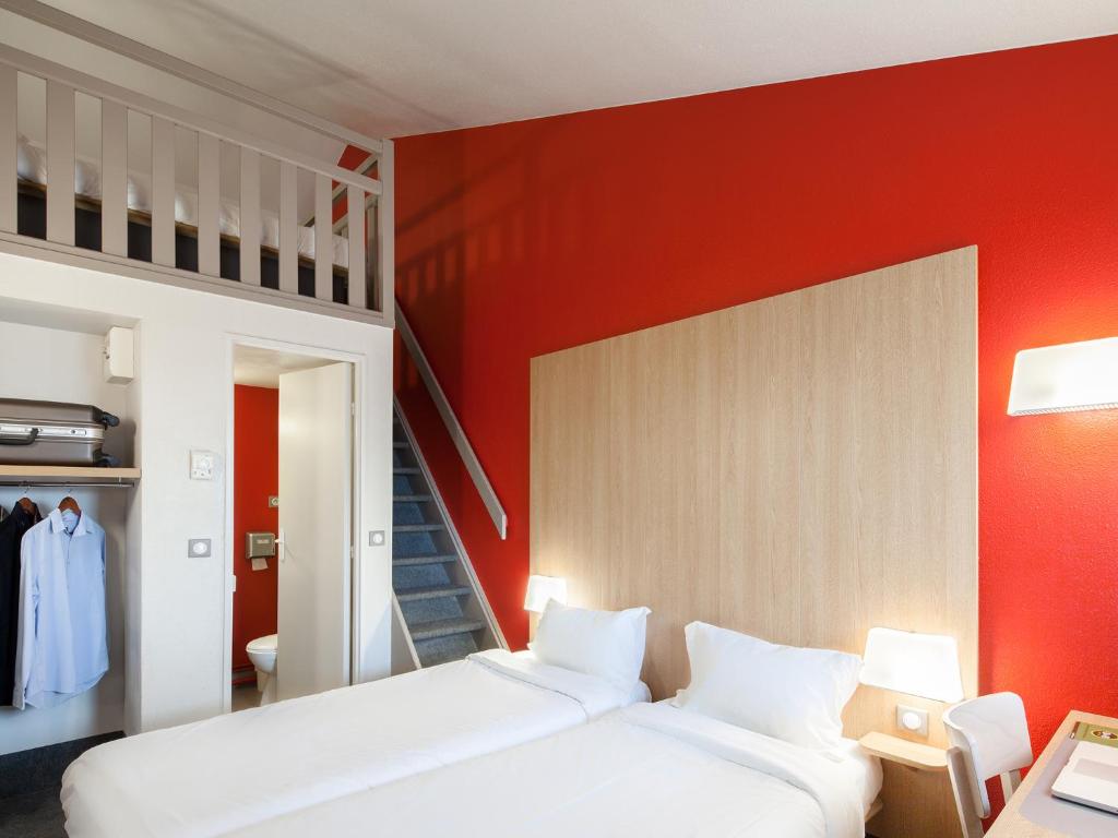 Postel nebo postele na pokoji v ubytování B&B HOTEL Amiens