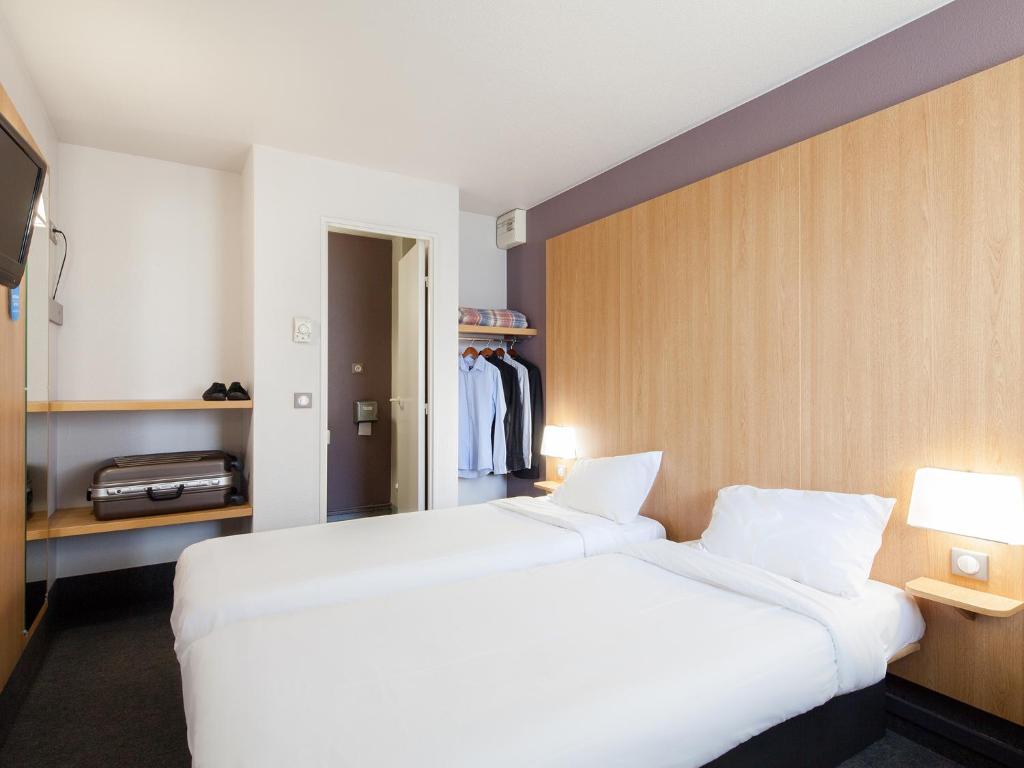 Postel nebo postele na pokoji v ubytování B&B HOTEL Amiens