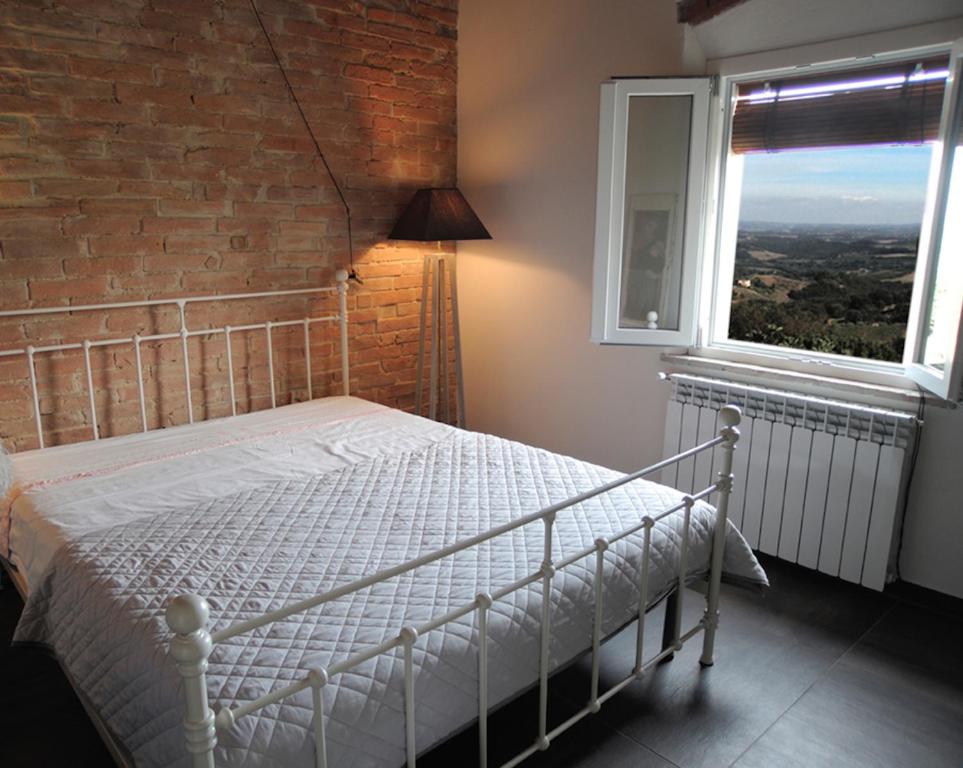 Postel nebo postele na pokoji v ubytování Casa Del Principe