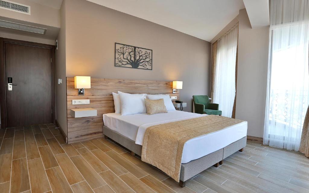 Postel nebo postele na pokoji v ubytování Kule Hotel