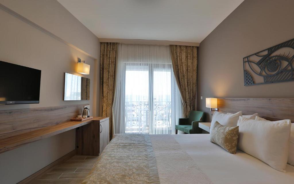 TV a/nebo společenská místnost v ubytování Kule Hotel