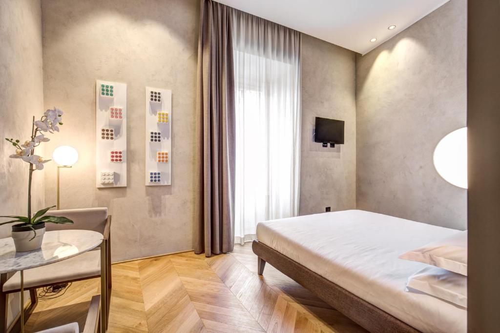 Posteľ alebo postele v izbe v ubytovaní G55 Design Hotel
