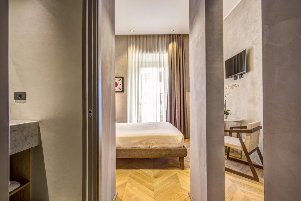 Posteľ alebo postele v izbe v ubytovaní G55 Design Hotel