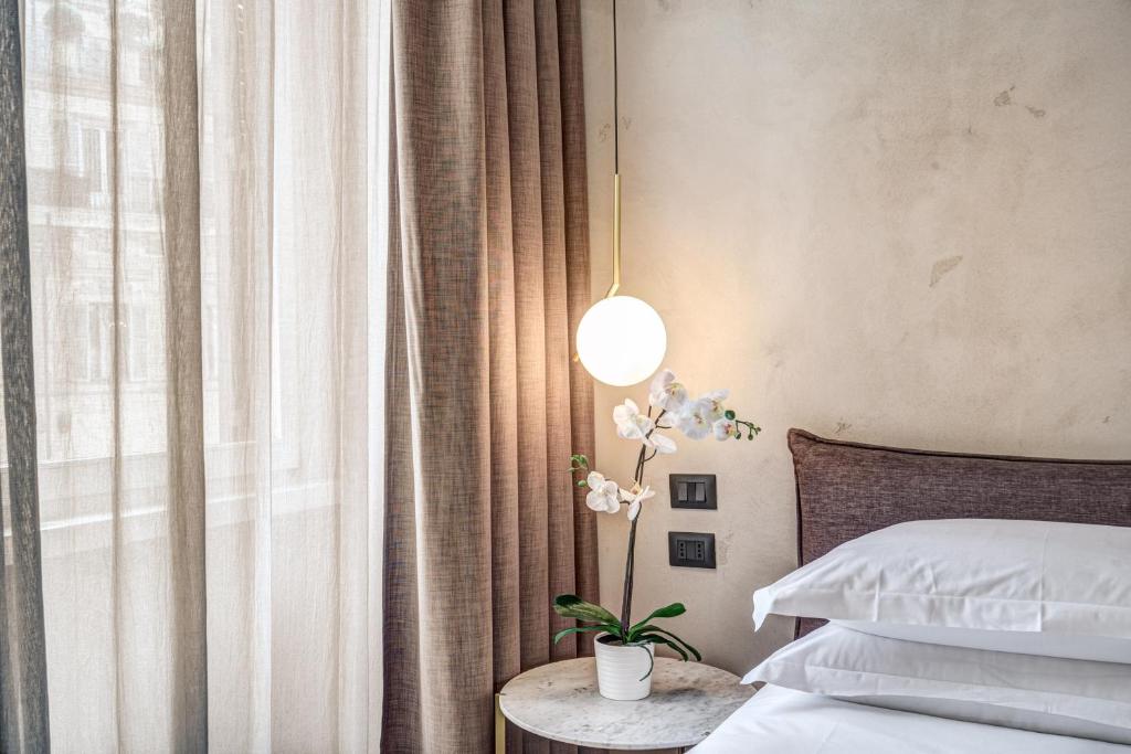 Posteľ alebo postele v izbe v ubytovaní G55 Design Hotel
