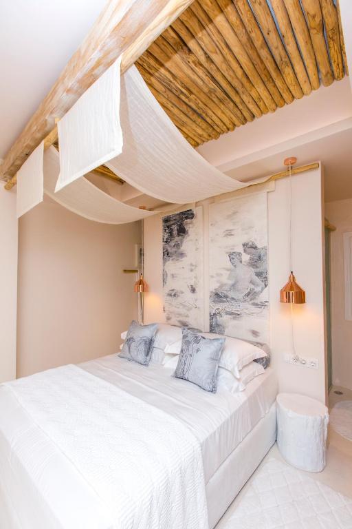 Postel nebo postele na pokoji v ubytování Sea Nymphs Suites