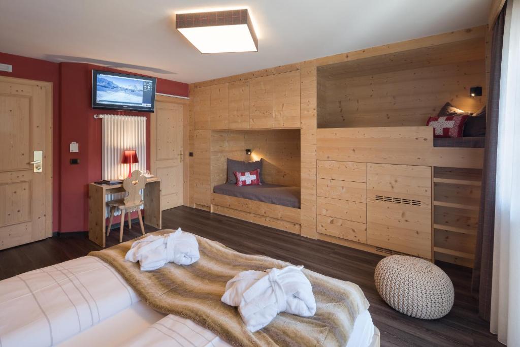 Postel nebo postele na pokoji v ubytování Hotel Somont