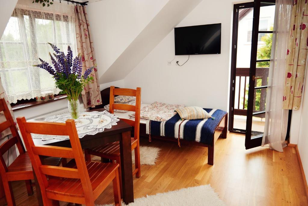 Postel nebo postele na pokoji v ubytování Willa Cicho Sza