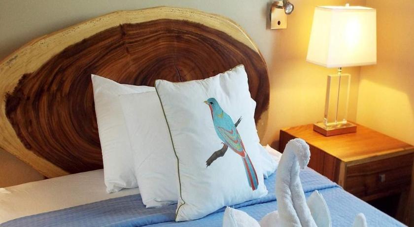 Postel nebo postele na pokoji v ubytování Hotel La Gaviota Tropical