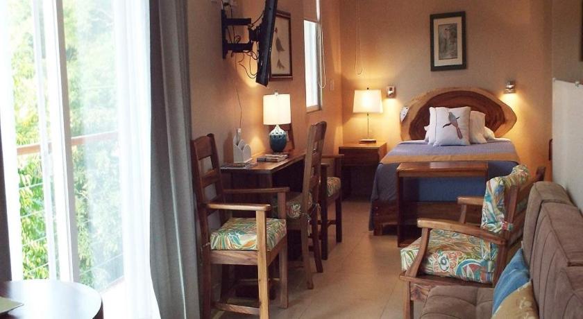 Postel nebo postele na pokoji v ubytování Hotel La Gaviota Tropical