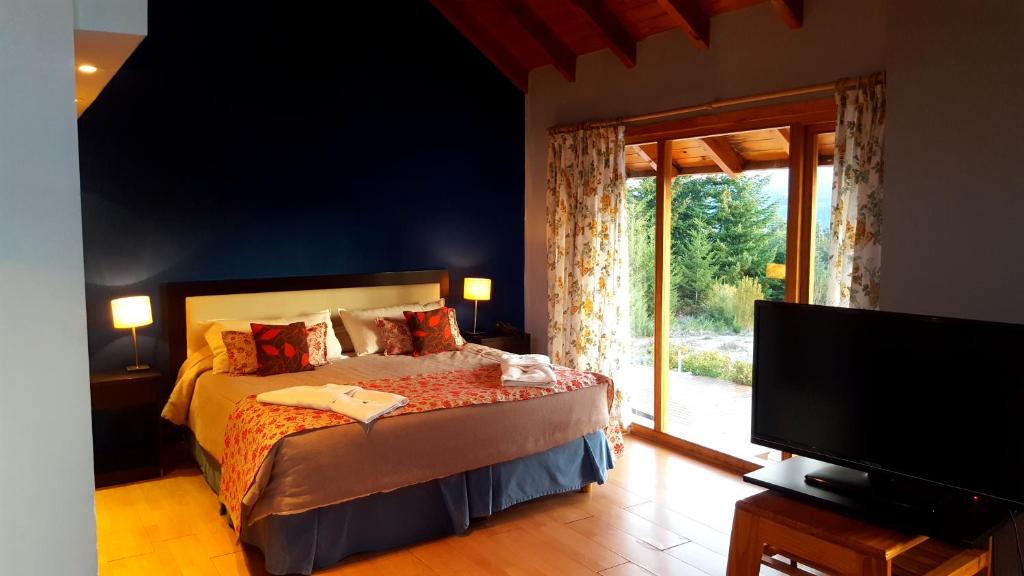 Una cama o camas en una habitación de Casa Del Bosque Aparts
