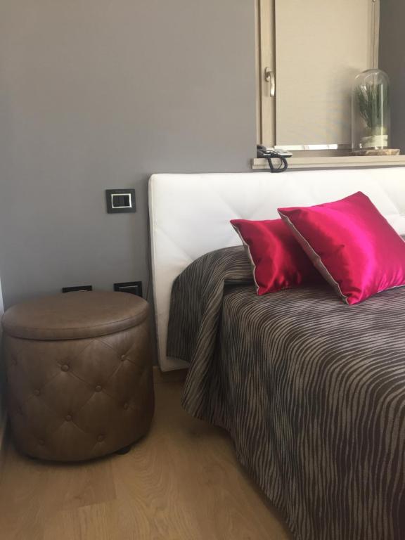 Postel nebo postele na pokoji v ubytování Albergo Ardesio Da Giorgio
