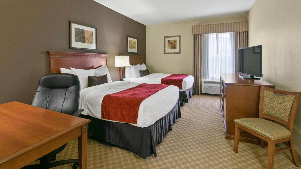 Postel nebo postele na pokoji v ubytování Best Western Plus Georgetown Inn & Suites