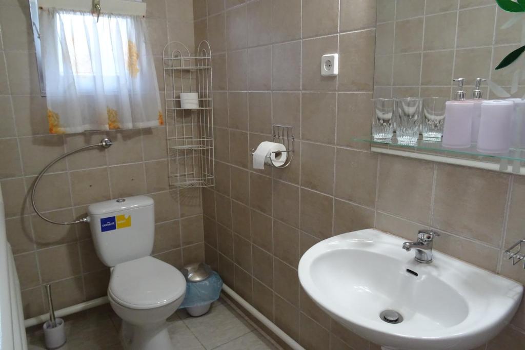 Koupelna v ubytování Altan Apartments