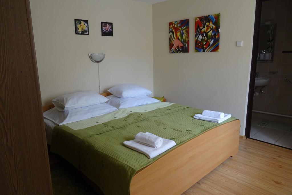 Postel nebo postele na pokoji v ubytování Altan Apartments