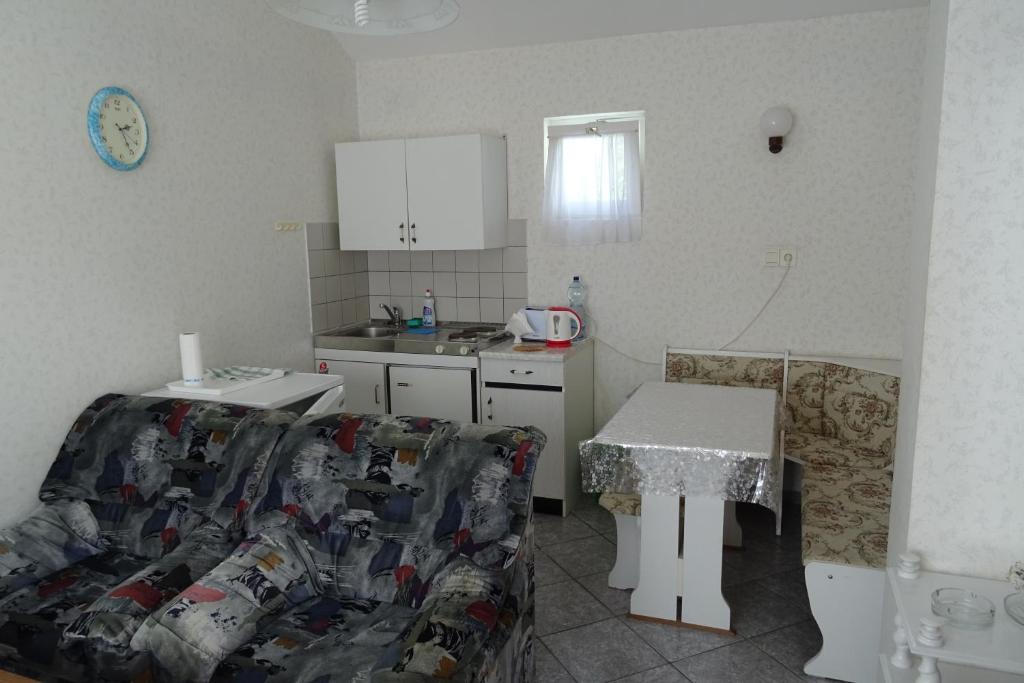 Kuchyň nebo kuchyňský kout v ubytování Altan Apartments