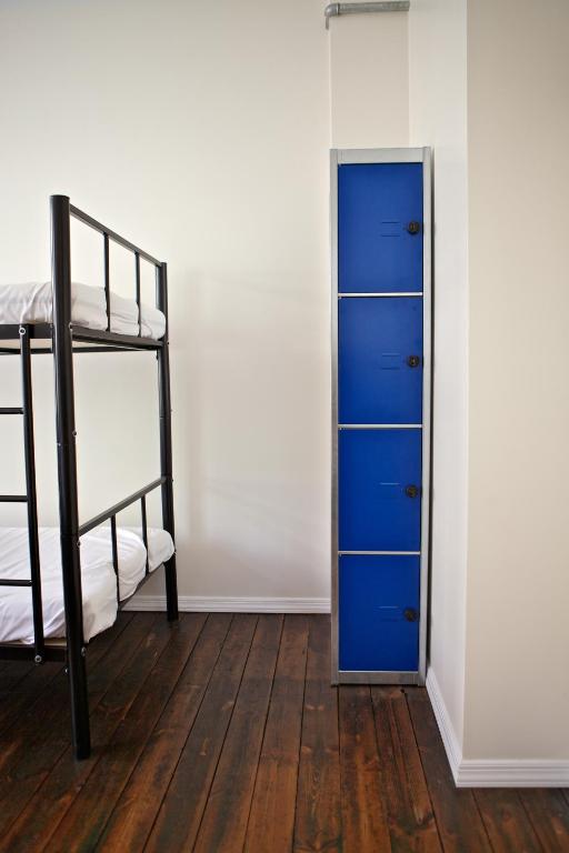 Postel nebo postele na pokoji v ubytování Akureyri Backpackers
