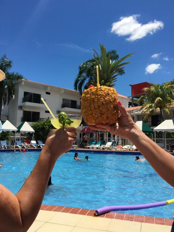 Bazén v ubytování Alborada Hotel Melgar nebo v jeho okolí