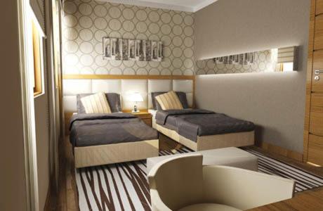 Ліжко або ліжка в номері Izmıt Saray Hotel