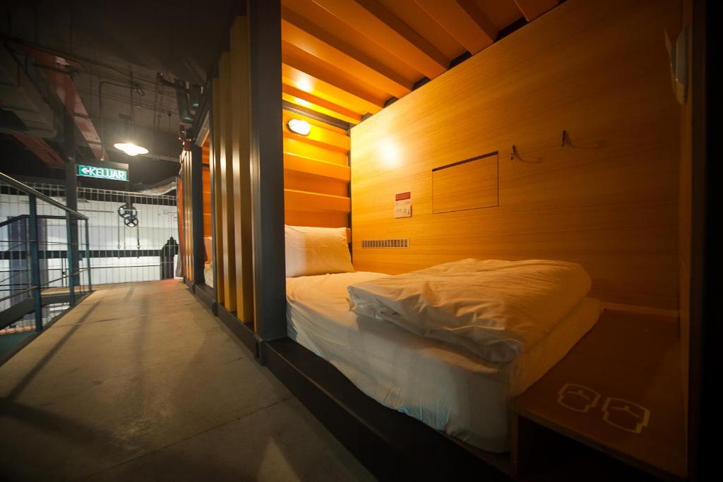 Letto o letti in una camera di CapsuleTransit Landside - Airport Hotel - Public Area - Gateway KLIA T2, Lvl 1