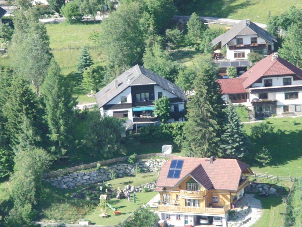 an aerial view of a large house in a village at Haus Verdi in Sankt Andrä im Lungau
