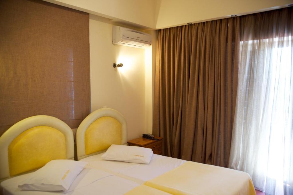 Voodi või voodid majutusasutuse Hotel Drosia toas
