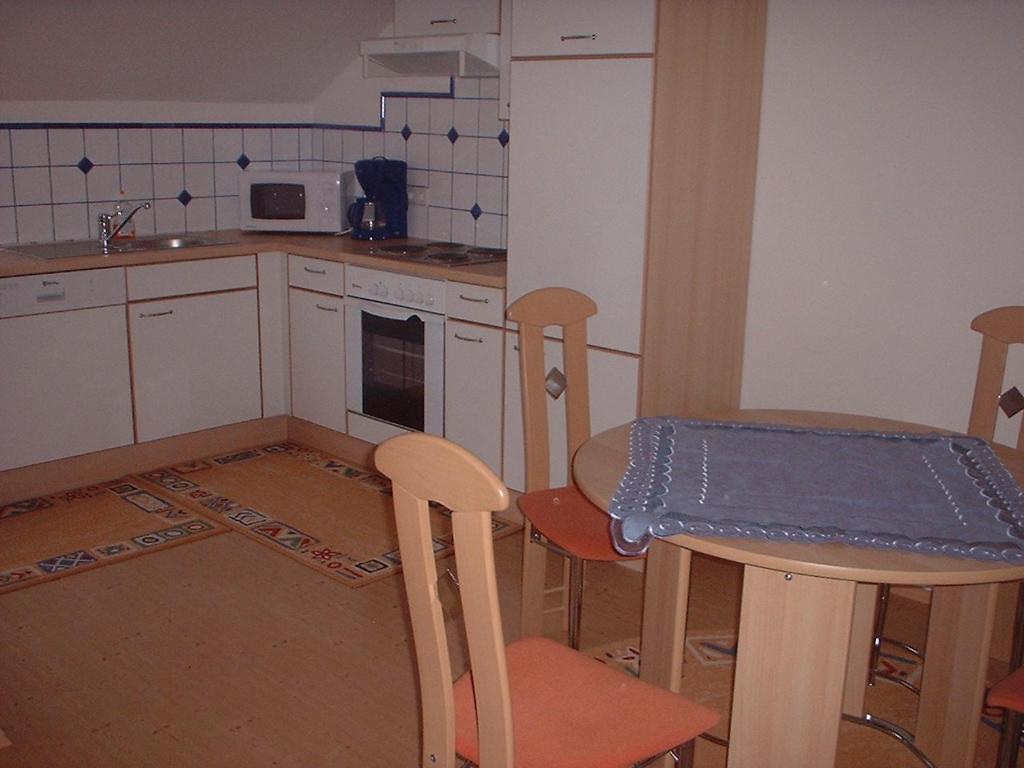 Kuchyň nebo kuchyňský kout v ubytování Gästehaus Maria