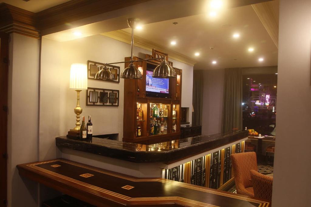 TV a/nebo společenská místnost v ubytování Herald Suites Polaris