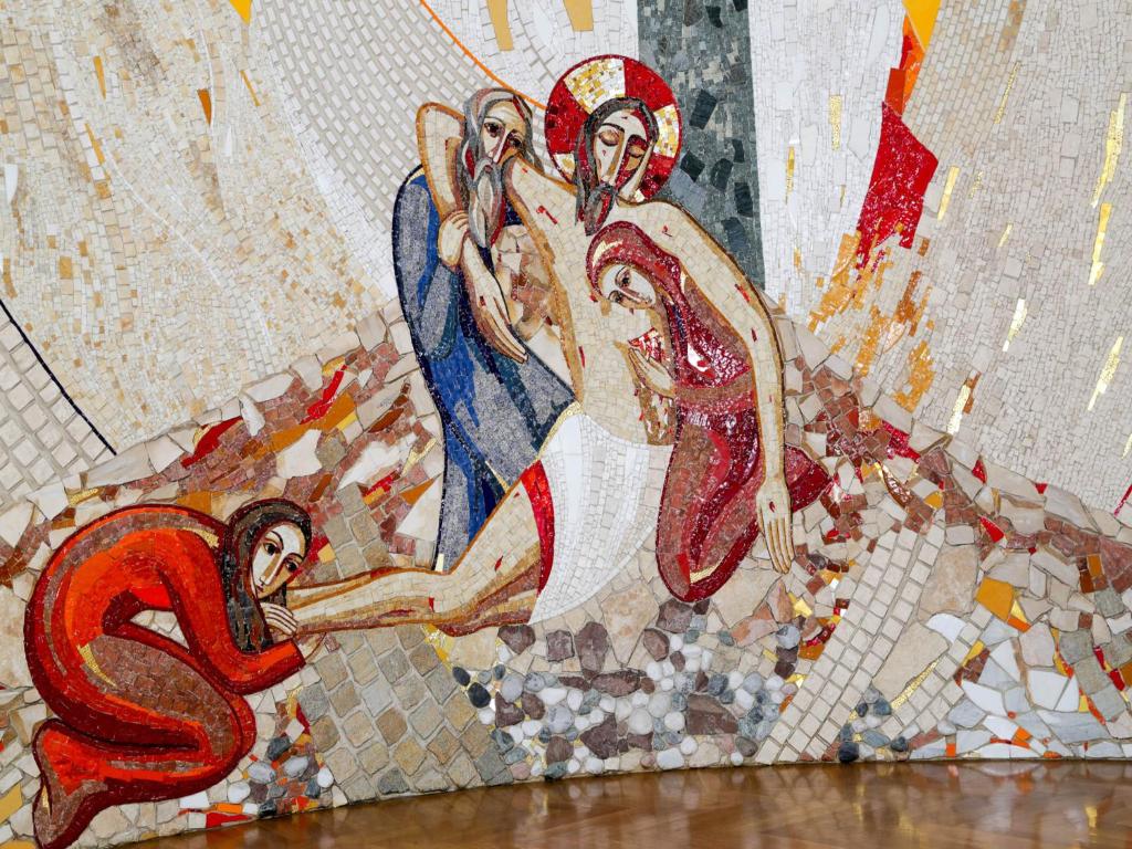 a mosaic mural of a woman and a man at Roma Room Hotel in Rome
