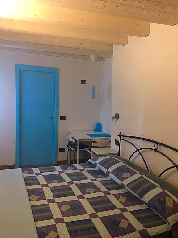 Postel nebo postele na pokoji v ubytování B&B El Piastrol