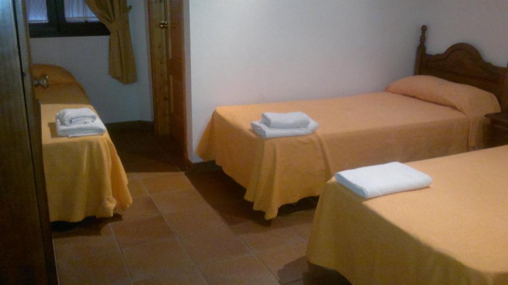 Postel nebo postele na pokoji v ubytování Hotel Restaurante Calderon