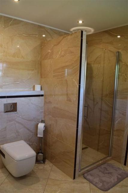 Łazienka w obiekcie Apartamenty Bahus - Centrum
