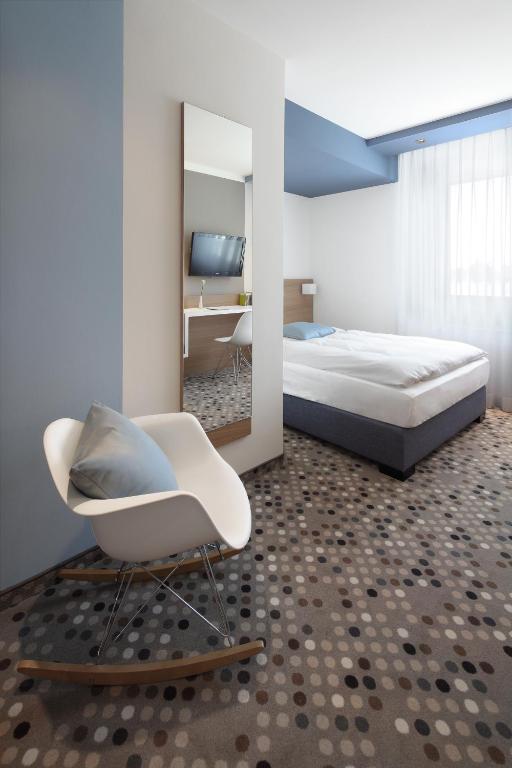 Postel nebo postele na pokoji v ubytování Hotel Waldhorn