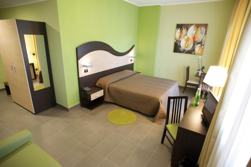 Posteľ alebo postele v izbe v ubytovaní Life Sport Hotel