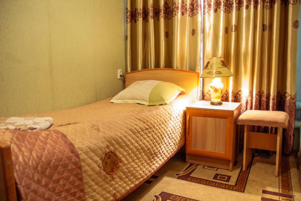 Postel nebo postele na pokoji v ubytování EniRest