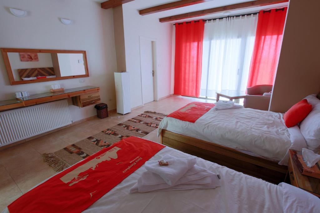 Voodi või voodid majutusasutuse Dana Guesthouse toas