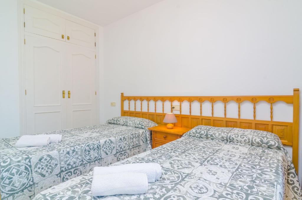 Postel nebo postele na pokoji v ubytování Ca Na Martina