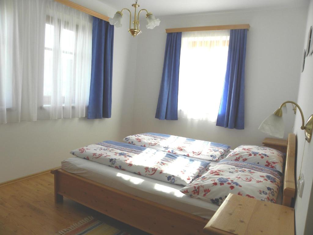 Postel nebo postele na pokoji v ubytování Gästehaus Lisa