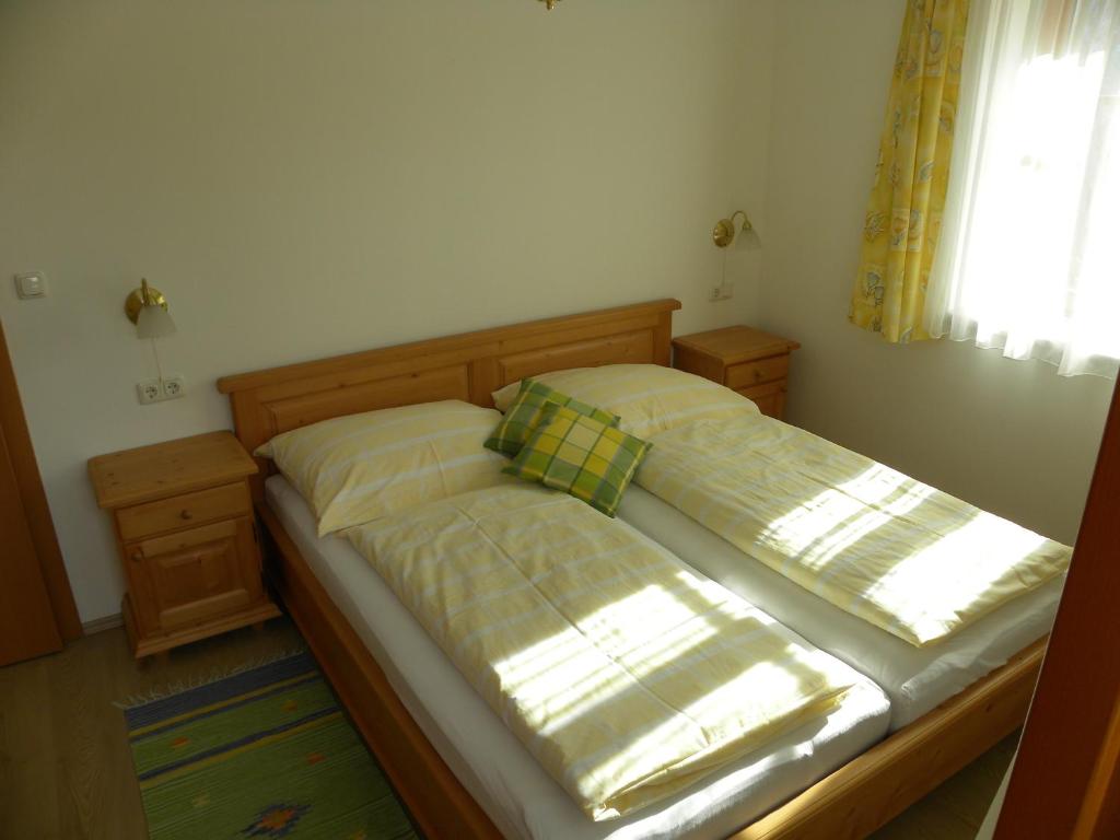 Postel nebo postele na pokoji v ubytování Gästehaus Lisa