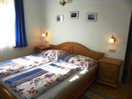 Postel nebo postele na pokoji v ubytování Gästehaus Lisa