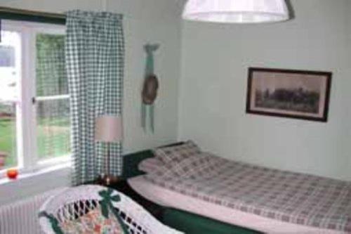 Postel nebo postele na pokoji v ubytování Mälby Säteri B&B
