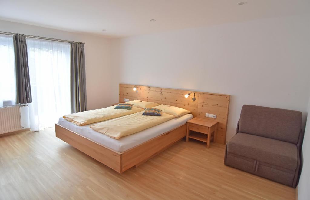 Postel nebo postele na pokoji v ubytování Hotel Ausseerland